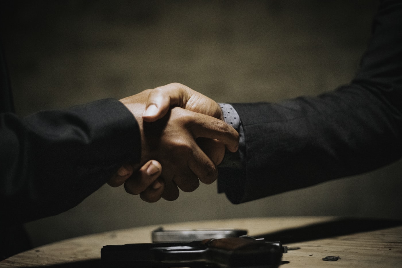 Two professionals shaking hands