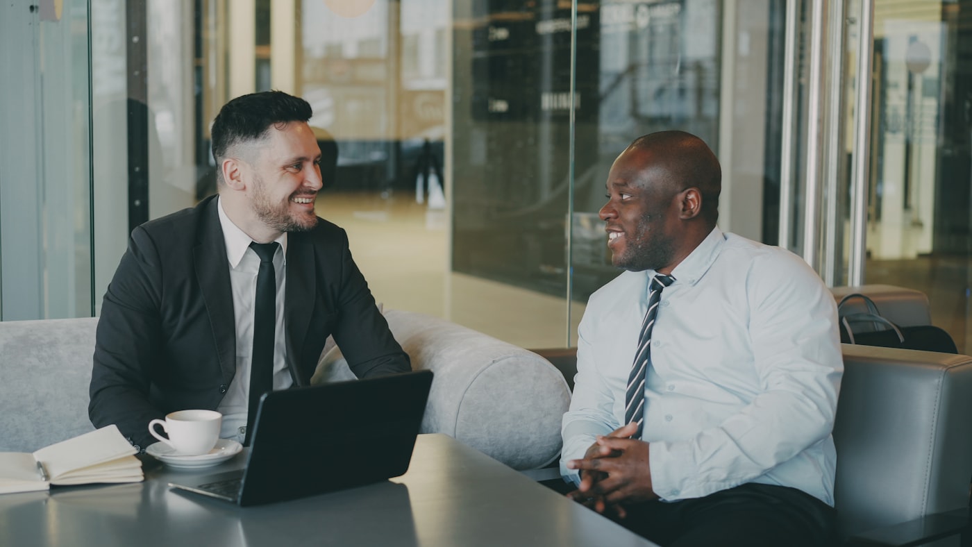 Two men in easy conversation
