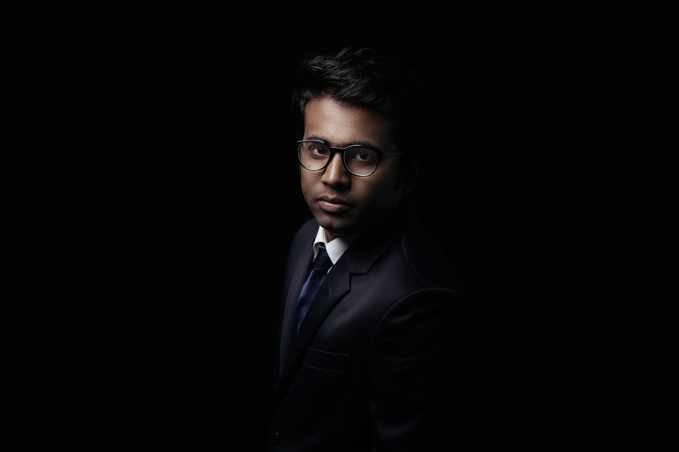 A sharp, low-key portrait — capable but cool